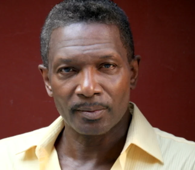 Sedly Bloomfield yellow shirt headshot